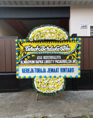 Papan Bunga Duka di Seli